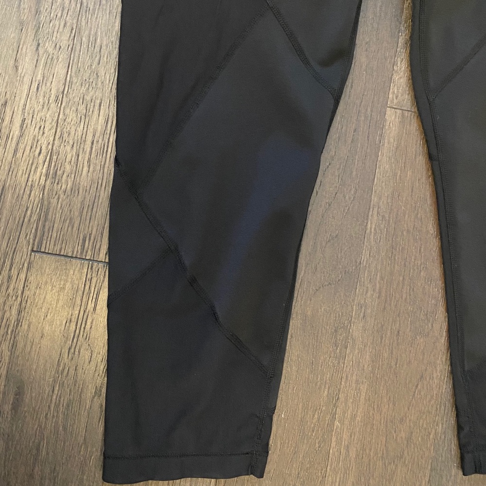 Athleta Black Cropped Leggings w/ Mesh Detail - Picture 2 of 3